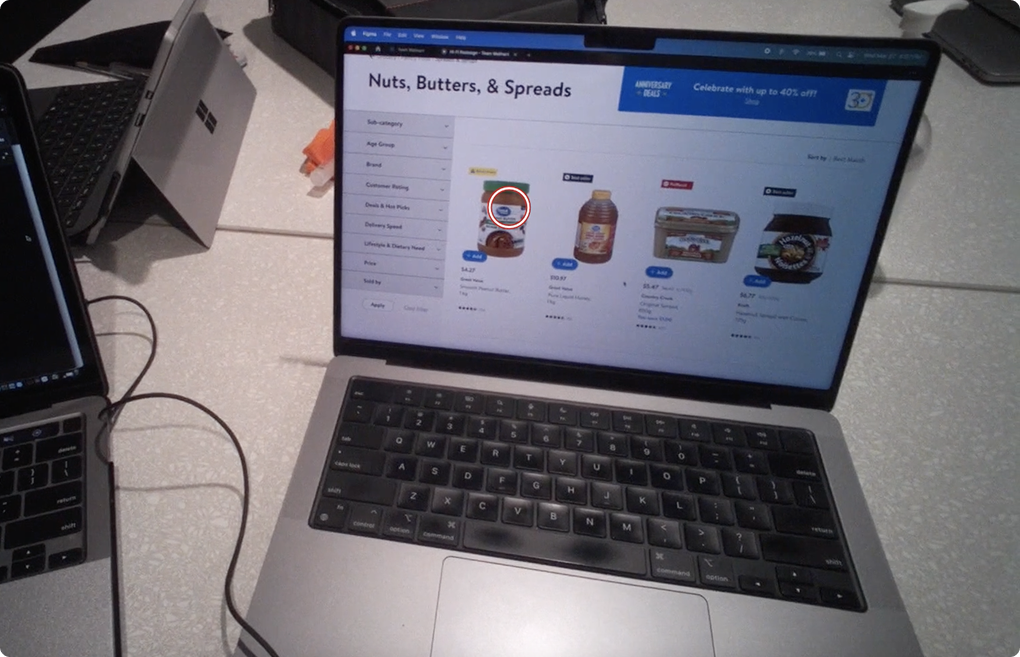 User testing session with laptop showing product page